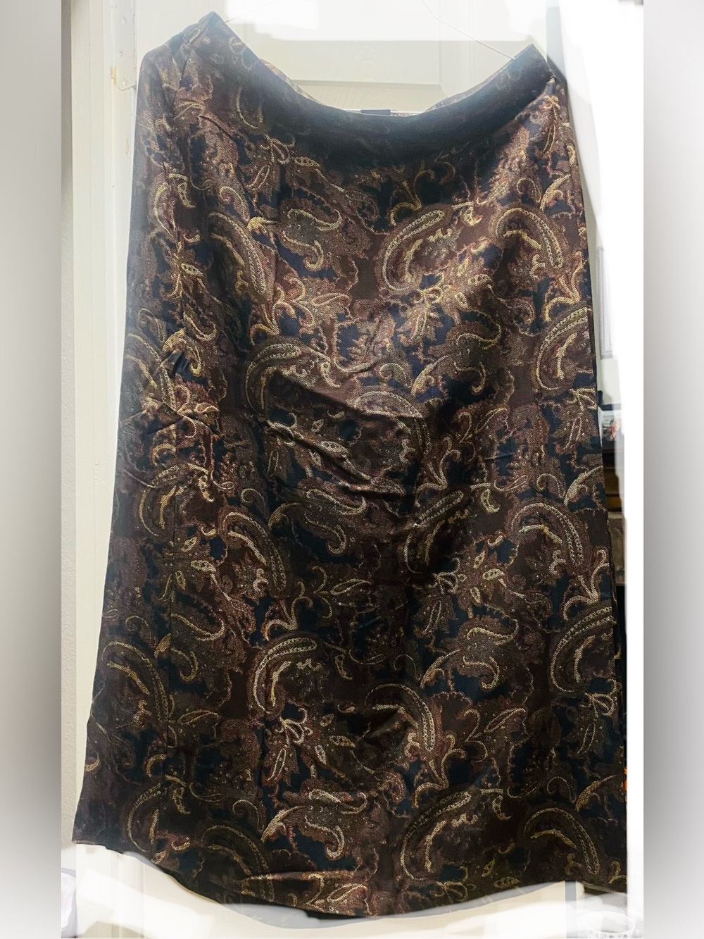 Brown and gold paisley skirt with gold and dark blue floral and scrollwork desig